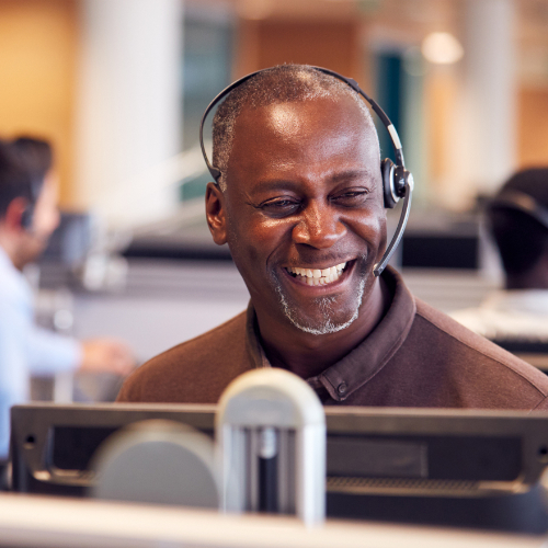 Microsoft Teams Phone - a man making a call using a headset