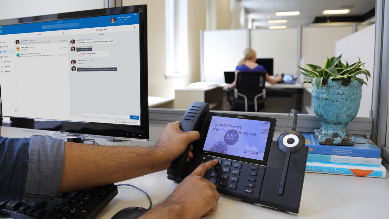 Man using Phone - VoIP Phone Systems