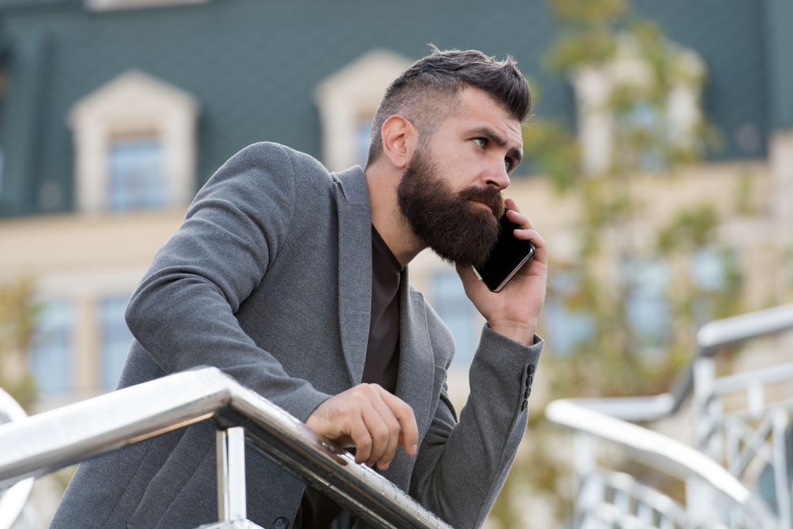Man on Phone - Mobile Device Management