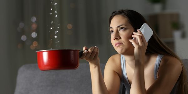 Woman with pot catching water - Customer Experience Challenges