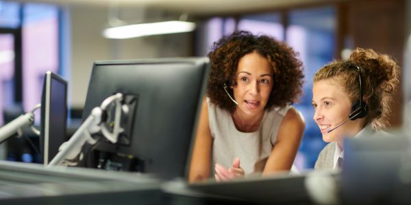 Women using Computer - Advanced Customer Experience
